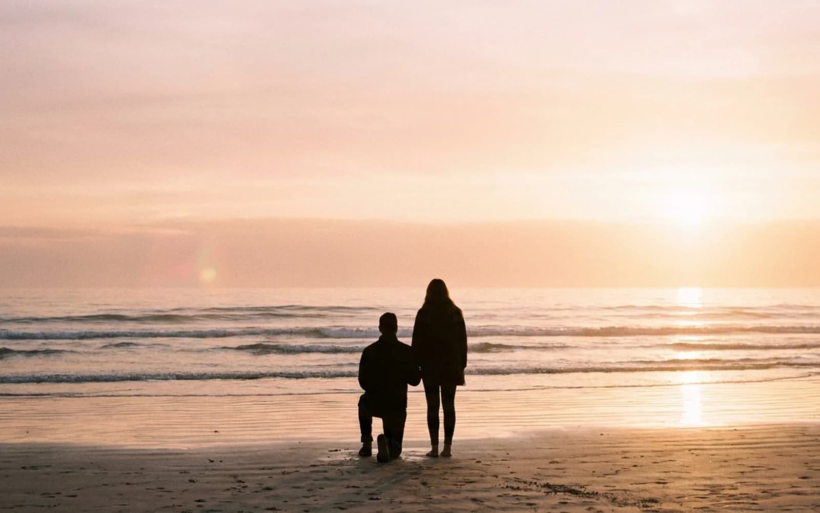 Sunrise beach proposal silhouette on a Gold Coast beach